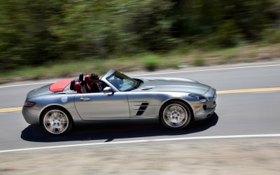 2012-mercedes-benz-sls-amg-roadster-side-in-motion.jpg