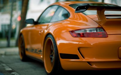 14790_porsche_orange_porsche.jpg