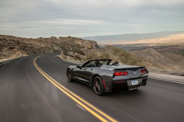 2014-Chevrolet-Corvette-Stingray-convertible-rear-three-quarters-in-motion.jpg