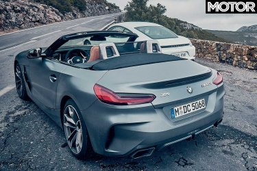 2018-BMW-Z4-M40i-vs-Porsche-718-Cayman-rear-design.jpg
