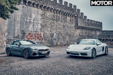 2018-BMW-Z4-M40i-vs-Porsche-718-Cayman-front-static.jpg