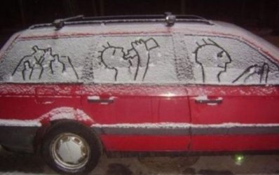 funny-snow-art-on-car-550x396.jpg