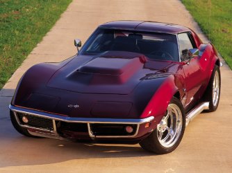 0311vet_04z+1969_Chevrolet_Corvette_Stingray+Maroon_Driver_Side_Front_View.jpg