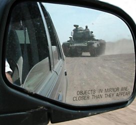 26244039.OBJECTSINMIRRORCLOSERTHANTHEYAPPEAR.jpg