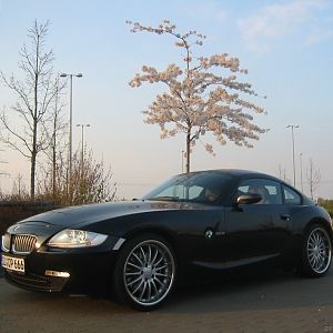 black car & blue sky