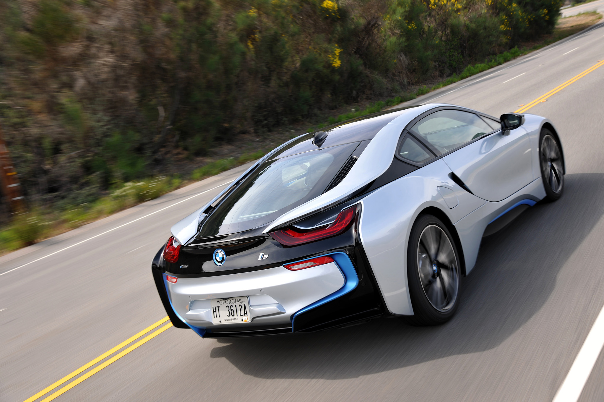 2014-BMW-i8-rear-three-quarters-in-motion.jpg